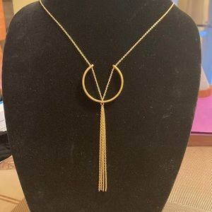 Hewa sophisticated gold tone pendant necklace with fringe tassel
